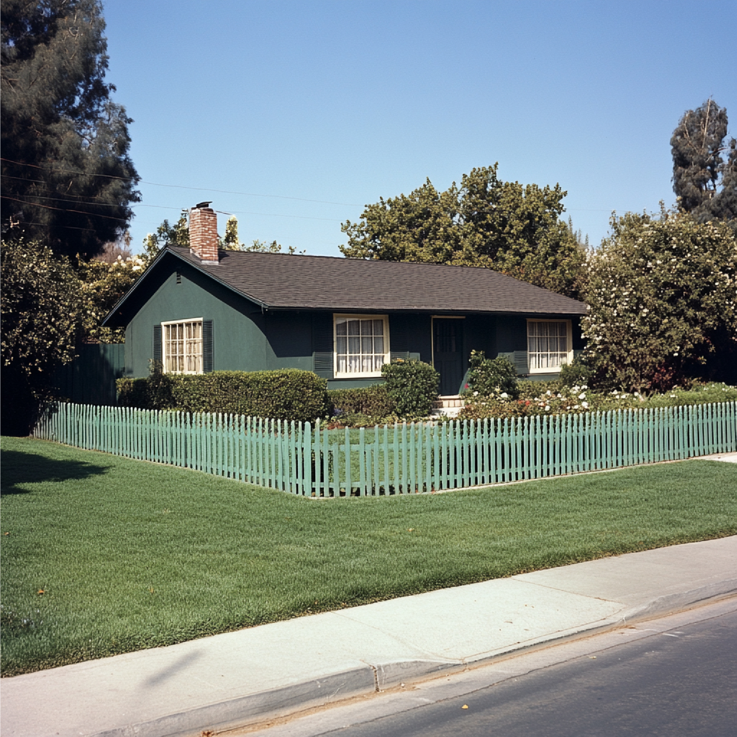 bungalow-with-wellmaintained-lawn-picket-fence